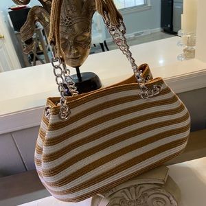 Tan and white straw bag
